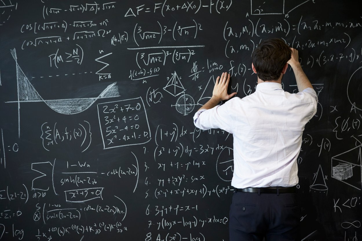 young-man-writing-blackboard